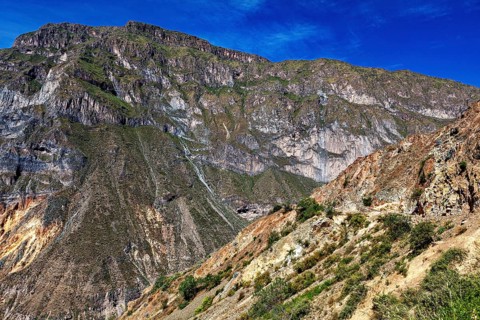View of rocky mountain landscape under blue sky, The landscape of Colca Canyon in the Aden of Peru