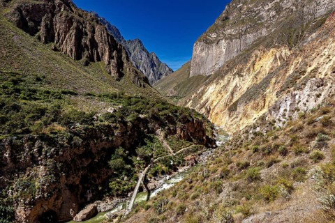 Impressive gorge landscape with winding river and surrounding steep mountain walls, The landscape