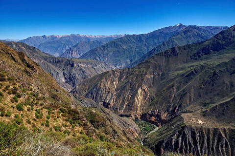 Impressive views of a deep gorge with steep mountain slopes and rocky formations, The landscape of