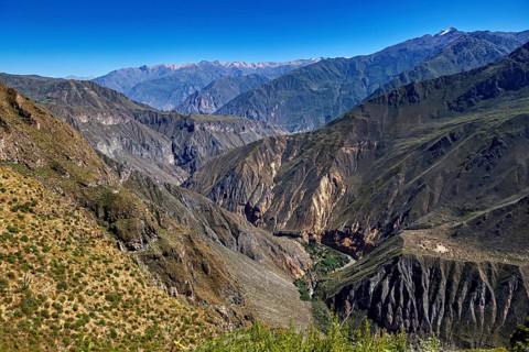 Wide views of majestic mountains and a deep, impressive gorge, The landscape of Colca Canyon in the