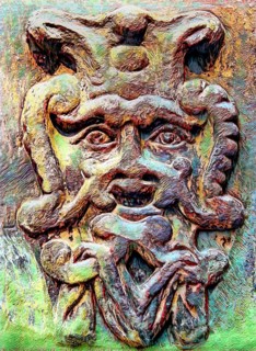 Old stone mask, face on a wall, Welf Castle of Herzberg, Herzberg am Harz, district of Göttingen,