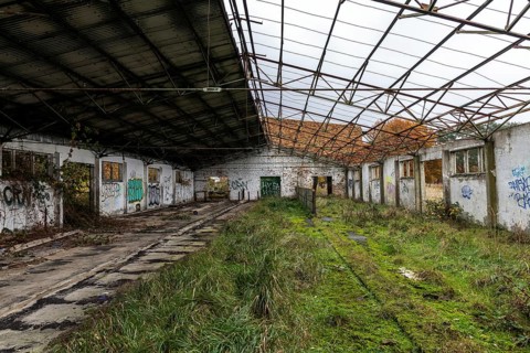 Former hall, dilapidated plant of a former agricultural production cooperative of the former GDR,
