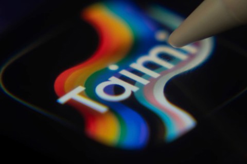 Dhaka, Bangladesh- 06 Dec 2025: Close-up of the Taimi app on a screen with a stylus pointing at it