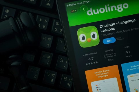 Dhaka, Bangladesh- 28 Oct 2025: An iPad displaying the Duolingo app against a judge's gavel and