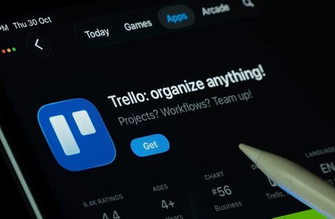 Dhaka, Bangladesh- 30 Oct 2025: Trello app displayed on a iPad screen in dark mode with a digital