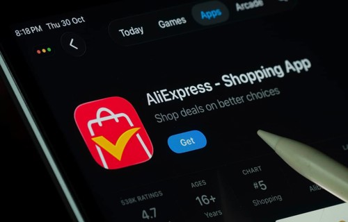 Dhaka, Bangladesh- 21 Nov 2025: AliExpress app displayed on a iPad screen in dark mode with a