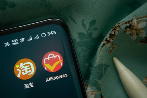 Dhaka, Bangladesh- 07 May 2025: Taobao and AliExpress app icon is seen on smartphone