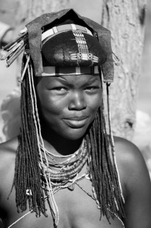 Black and white, portrait, brightly decorated woman of the Hakaona tribe, also Havakona or