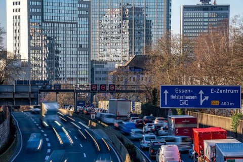 The A40 motorway, Ruhrschnellweg, in Essen, city skyline, Evonik office building, traffic jam in