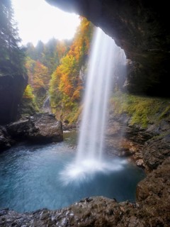 Waterfall mountain list in autumn-colored surroundings, Linthal, Klausenpass, Canton of Glarus,