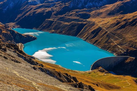 The dam and turquoise lake Lac de Moiry, Val d'Anniviers, Valais Alps, Canton of Valais,