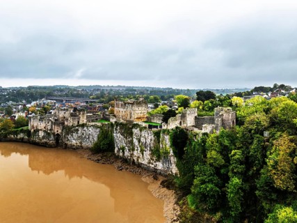 Autumn over Chepstow Castle and River Wye from a drone, Chepstow, Monmouthshire, Wales, UK