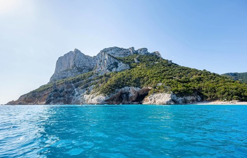 Picturesque rocky coast, cliffs and blue sea, Golfo di Orosei, Baunei, Sardinia, Italy
