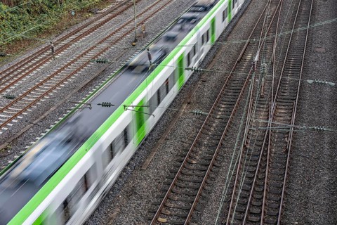 S-Bahn train on the route east, in front of Essen main station, regional transport in North