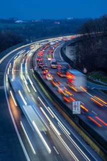 Evening traffic on the A52 motorway, between Düsseldorf and Essen, at the Ruhr Valley Bridge,