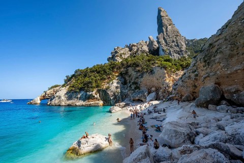 Light blue clear sea on a dream beach on Cala Goloritzé, picturesque rocky coast, steep coast with