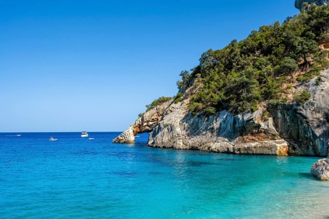 Light blue clear sea on a dream beach on Cala Goloritzé, picturesque rocky coast, cliffs with rock