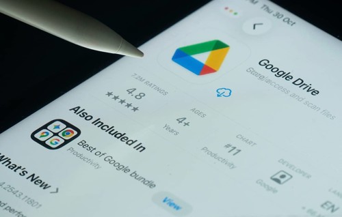 Dhaka, Bangladesh- 30 Oct 2025: Google Drive app on a iPad screen with a pen pointing at the