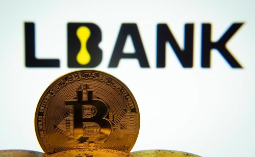 Dhaka, Bangladesh- 03 Sep 2025: Close-up of Bitcoin coins with the LBank logo visible on a screen