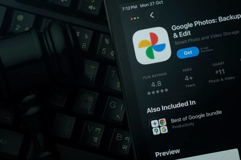 Dhaka, Bangladesh- 28 Oct 2025: An iPad displaying the Google Photos app against a judge's gavel