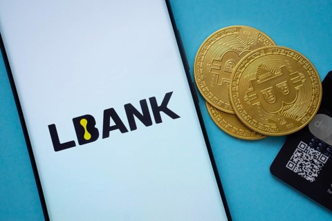 Dhaka, Bangladesh- 03 Sep 2025: Lbank logo on smartphone screen near Bitcoin coin and QR code on