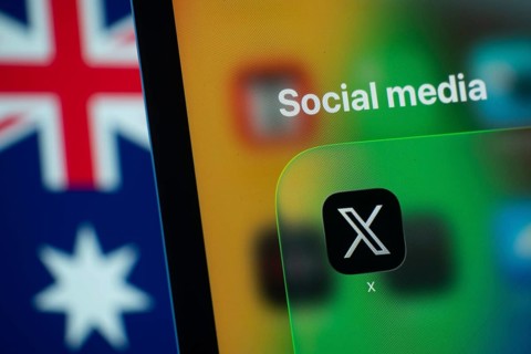 Dhaka, Bangladesh- 01 Dec 2025: A smartphone screen displays the X app with an Australian flag in