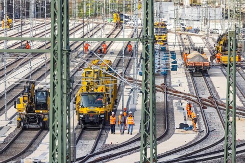 Rail construction crews with a work train. New parking station in Untertürkheim. As part of