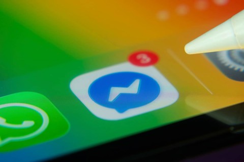 16 Nov 2025- Dhaka, Bangladesh: Stylus touching the Facebook Messenger app icon with a notification