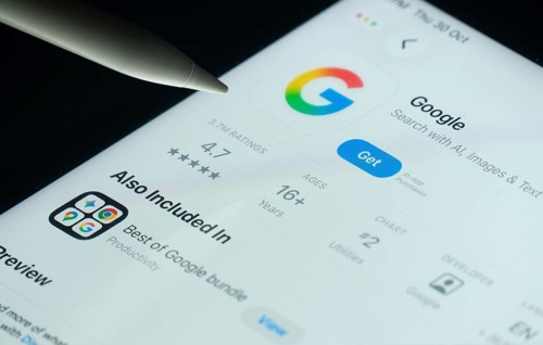 Dhaka, Bangladesh- 30 Oct 2025: Google app on a iPad screen with a pen pointing at the install