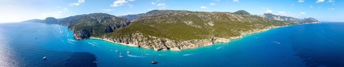 Panorama, picturesque rocky coast, cliffs and Cala Luna beach, aerial view, Golfo di Orosei,
