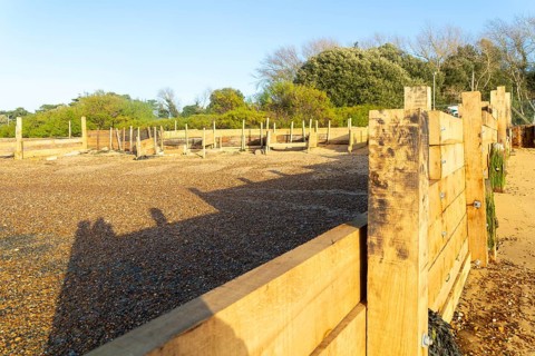 Temporary coastal defences erected by Bawdsey Haven Yacht Club, response to rapid erosion beach