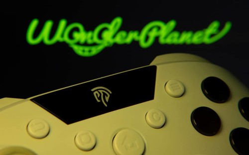 Dhaka, Bangladesh- 14 Nov 2025: A close-up of a gamepad with the WonderPlanet Inc seen on screen in