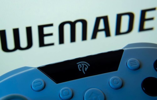 Dhaka, Bangladesh- 14 Nov 2025: A close-up of a gamepad with the WeMade Entertainment seen on