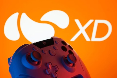 Dhaka, Bangladesh- 14 Nov 2025: A close-up of a gamepad with the XD seen on screen in the