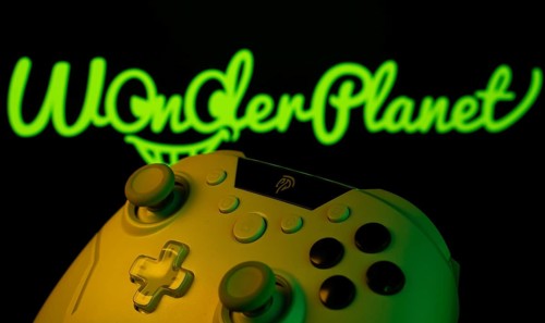 Dhaka, Bangladesh- 14 Nov 2025: A close-up of a gamepad with the WonderPlanet Inc seen on screen in