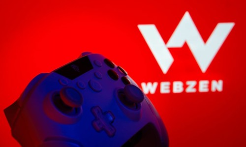 Dhaka, Bangladesh- 14 Nov 2025: A close-up of a gamepad with the Webzen seen on screen in the