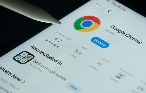 Dhaka, Bangladesh- 30 Oct 2025: Google Chrome app on a iPad screen with a pen pointing at the