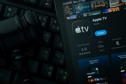 Dhaka, Bangladesh- 28 Oct 2025: An iPad displaying the Apple TV app against a judge's gavel and