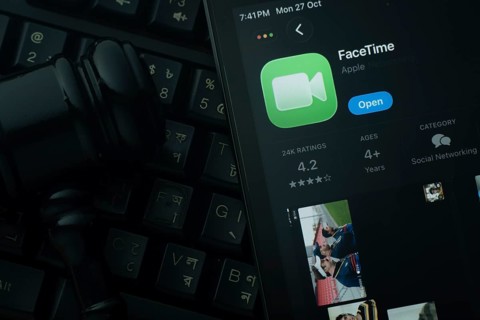 Dhaka, Bangladesh- 28 Oct 2025: An iPad displaying the Apple Facetime app against a judge's gavel