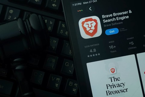 Dhaka, Bangladesh- 28 Oct 2025: An iPad displaying the Brave browser app against a judge's gavel
