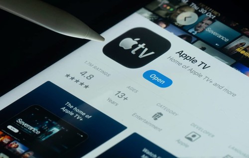 Dhaka, Bangladesh- 30 Oct 2025: Apple TV app on a iPad screen with a pen pointing at the install