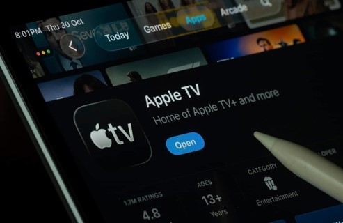 Dhaka, Bangladesh- 30 Oct 2025: Apple TV app displayed on a iPad screen in dark mode with a digital