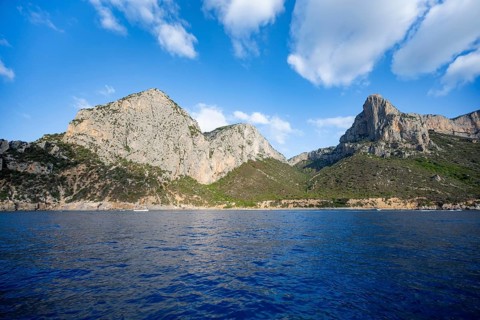 Picturesque rocky coast, cliffs and blue sea, Golfo di Orosei, Baunei, Sardinia, Italy