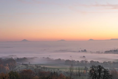 Three Kaiserberge mountains in golden morning light, Hohenstaufen, Aichelberg. Spectacular dawn
