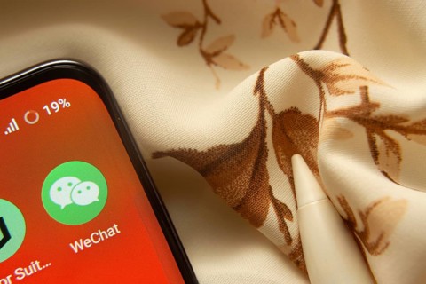 Dhaka, Bangladesh- 07 May 2025: wechat app icon is seen on smartphone