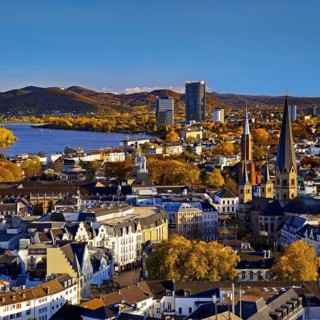 Autumn panoramic view from the town house of Bonn Minster, the Post Tower, the Rhine and the