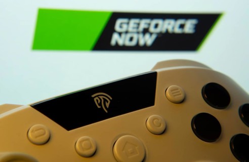 Dhaka, Bangladesh- 14 Nov 2025: A close-up of a gamepad with the Geforce Now seen on screen in the