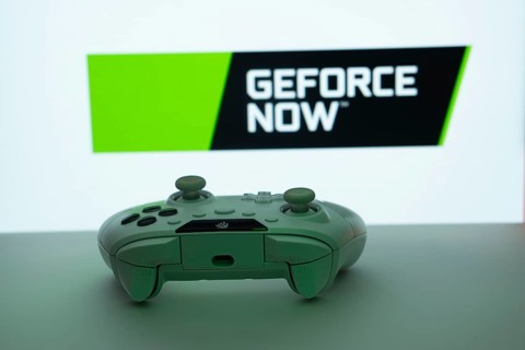 Dhaka, Bangladesh- 14 Nov 2025: A close-up of a white gamepad with the Geforce Now seen on screen
