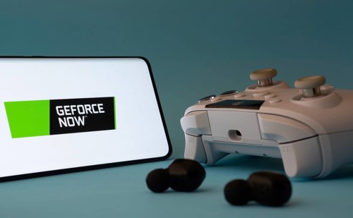 Dhaka, Bangladesh- 23 Mar 2025: A smartphone with a Geforce Now icon next to a controller and