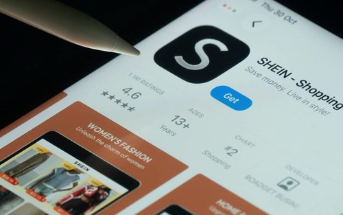 Dhaka, Bangladesh- 30 Oct 2025: SHEIN app on a iPad screen with a pen pointing at the install